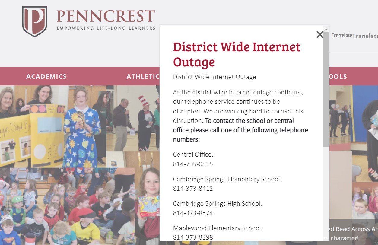 The home page of the district's site has a pop-up about the internet outage affecting the telephone system with numbers that can be called.   